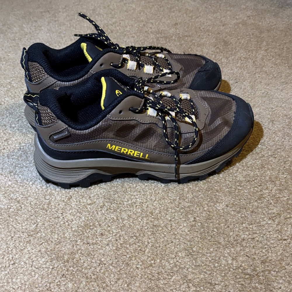 Merrell Kid’s Tan and Black Athletic Shoes